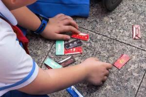 近期小学生风靡玩“烟卡”, 三亚市教育局: 禁止带入校园, 可没收